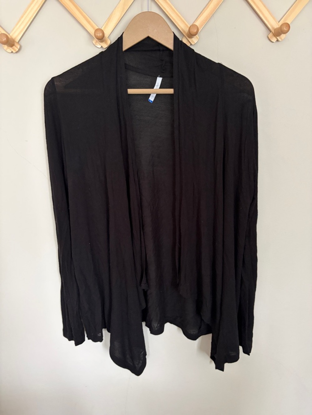 Tresics Black semi
Sheer drape open cardigan